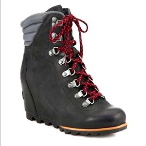 Black Sorel wedges with red laces